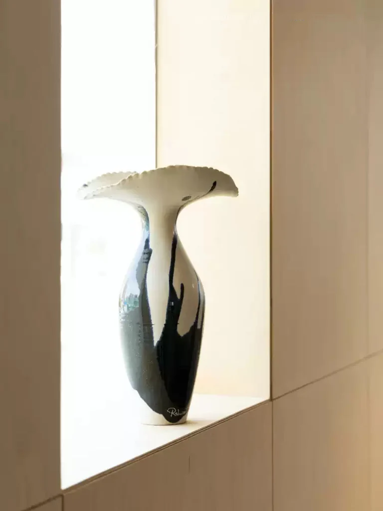 Artistic LA Imported Handcrafted Black and Gold Ceramic Vase with Flowing Glaze Design - Image 9