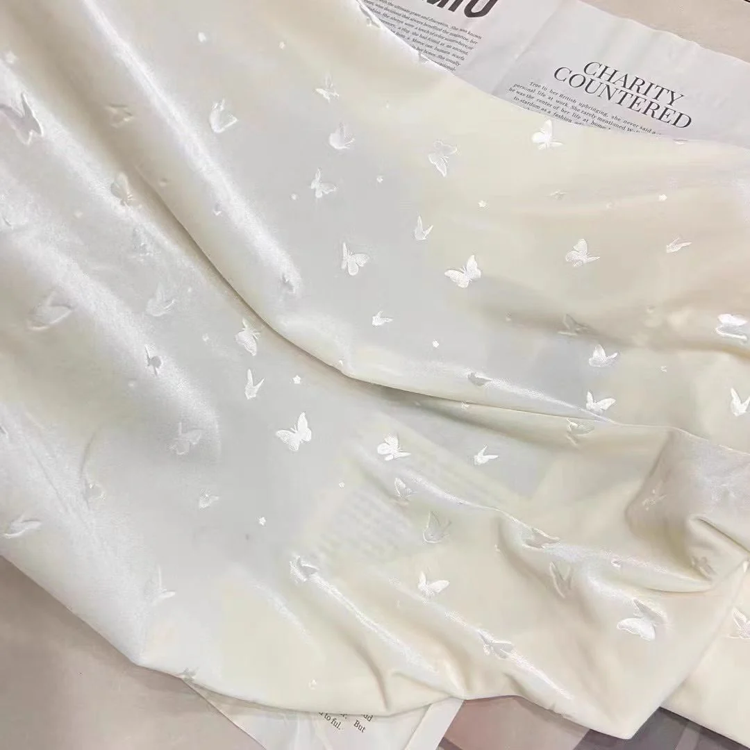 Cream White Velvet Fabric with Embossed Butterflies for Dresses and DIY Projects - Image 2