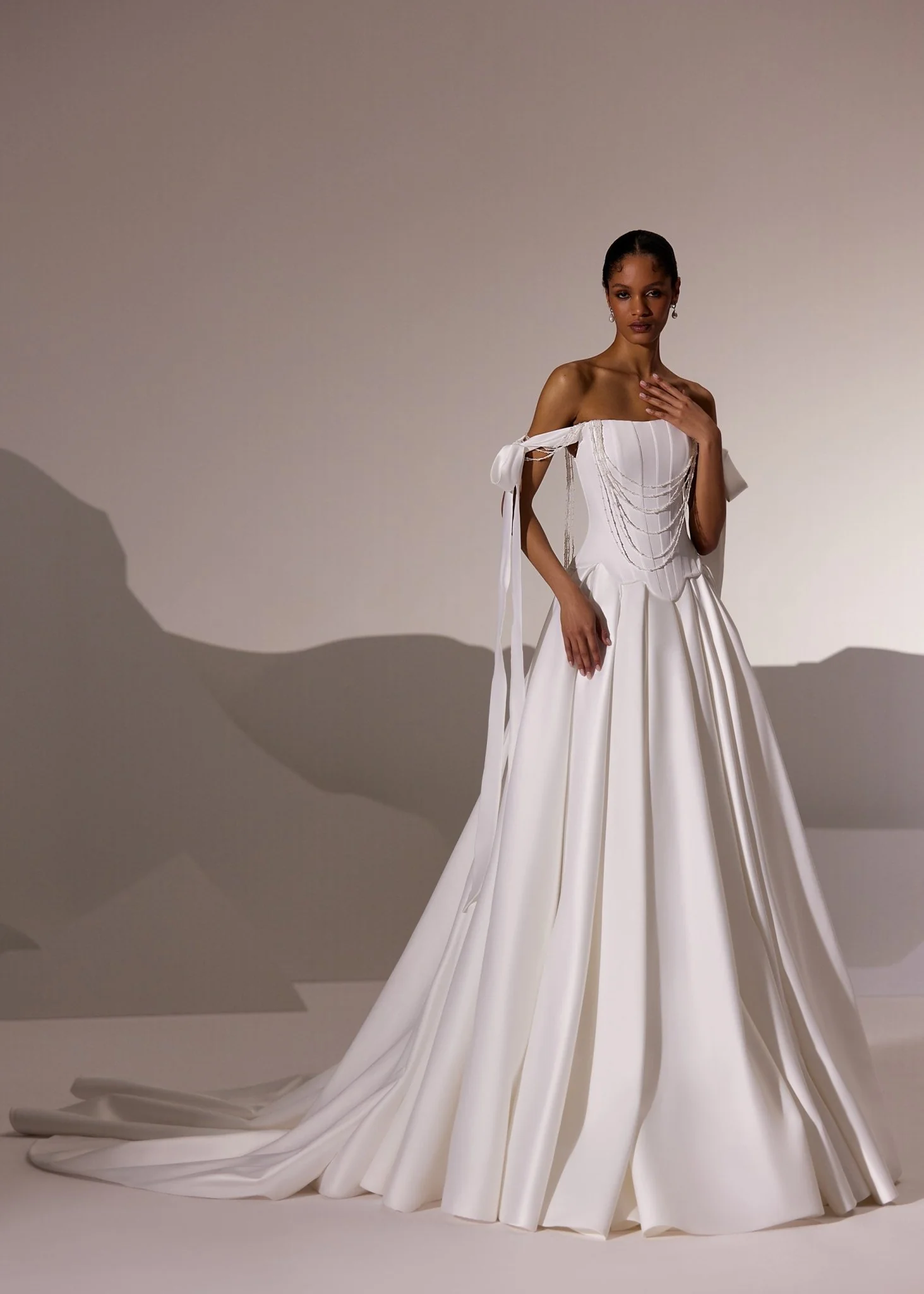 White Off-Shoulder Corset Wedding Gown with Draped Bodice and Flowing Train - Plus Size