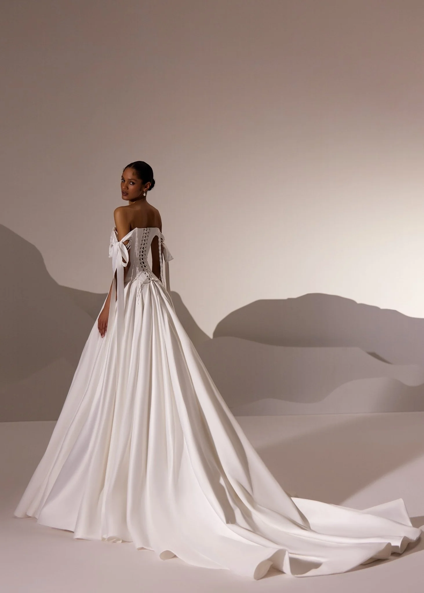 White Off-Shoulder Corset Wedding Gown with Draped Bodice and Flowing Train - Plus Size - Image 4
