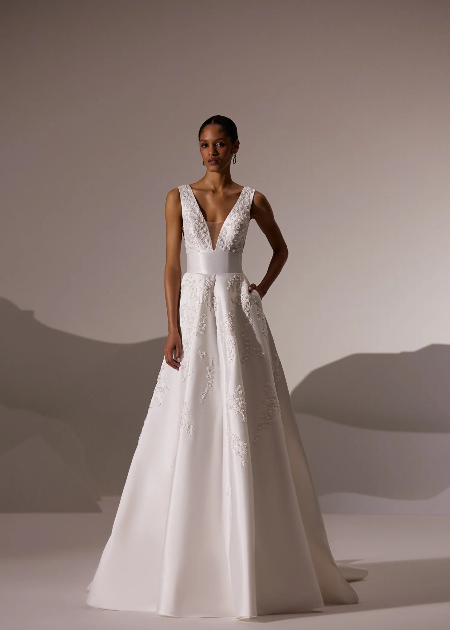 White V-Neck Wedding Dress with Floral Embroidery and Flowing Train - Plus Size