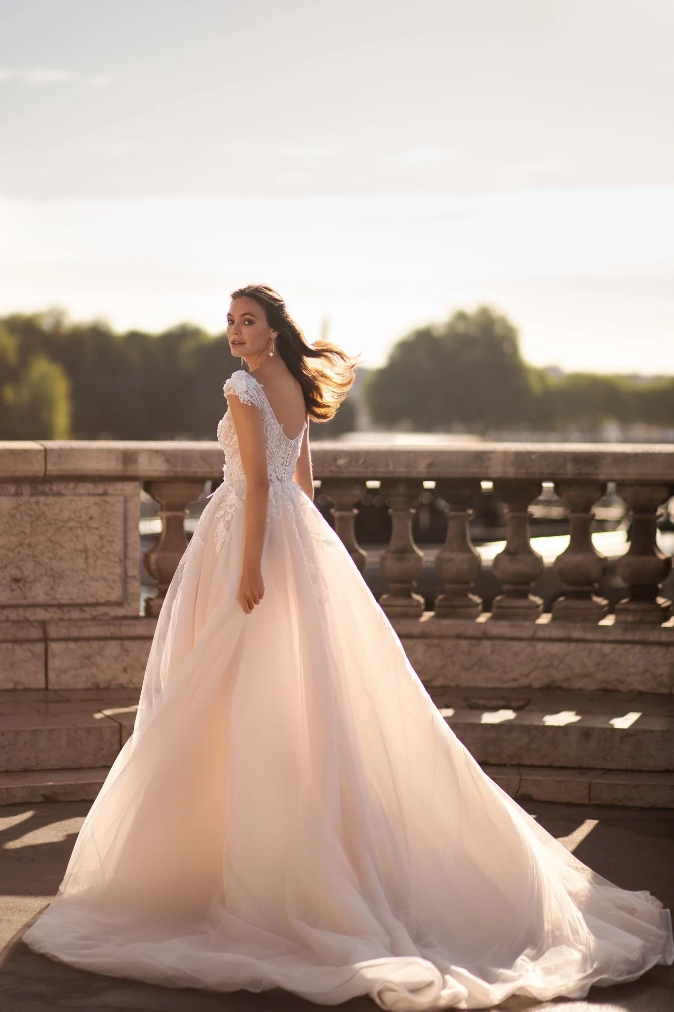 Nude Wedding Dress with Long Sheer Sleeves, 3D Floral Appliqués, and Voluminous Glitter Tulle Skirt Plus Size - Image 3