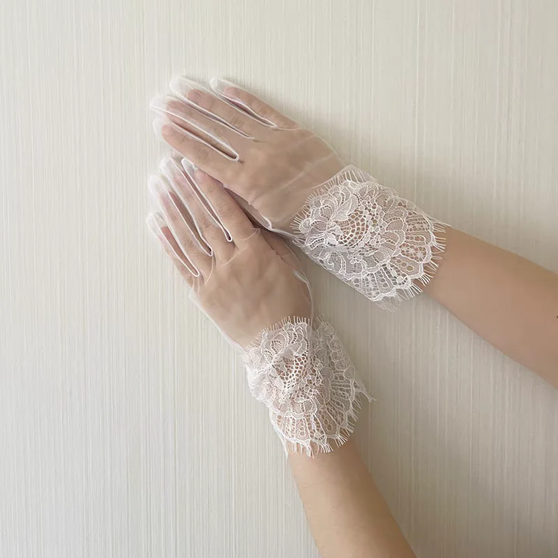 Sheer White Gloves with Intricate Lace Cuffs - Image 2