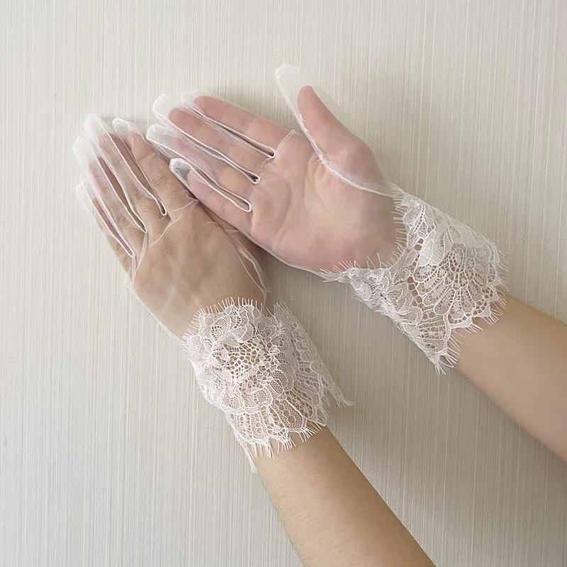 Sheer White Gloves with Intricate Lace Cuffs - Image 4